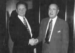 The picture is of President Maurer and Dr. Jernigan shaking hands.)
