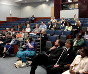 Participants in the GAMA Summitt listen to a presentation in the Jernigan Institute Auditorium.
